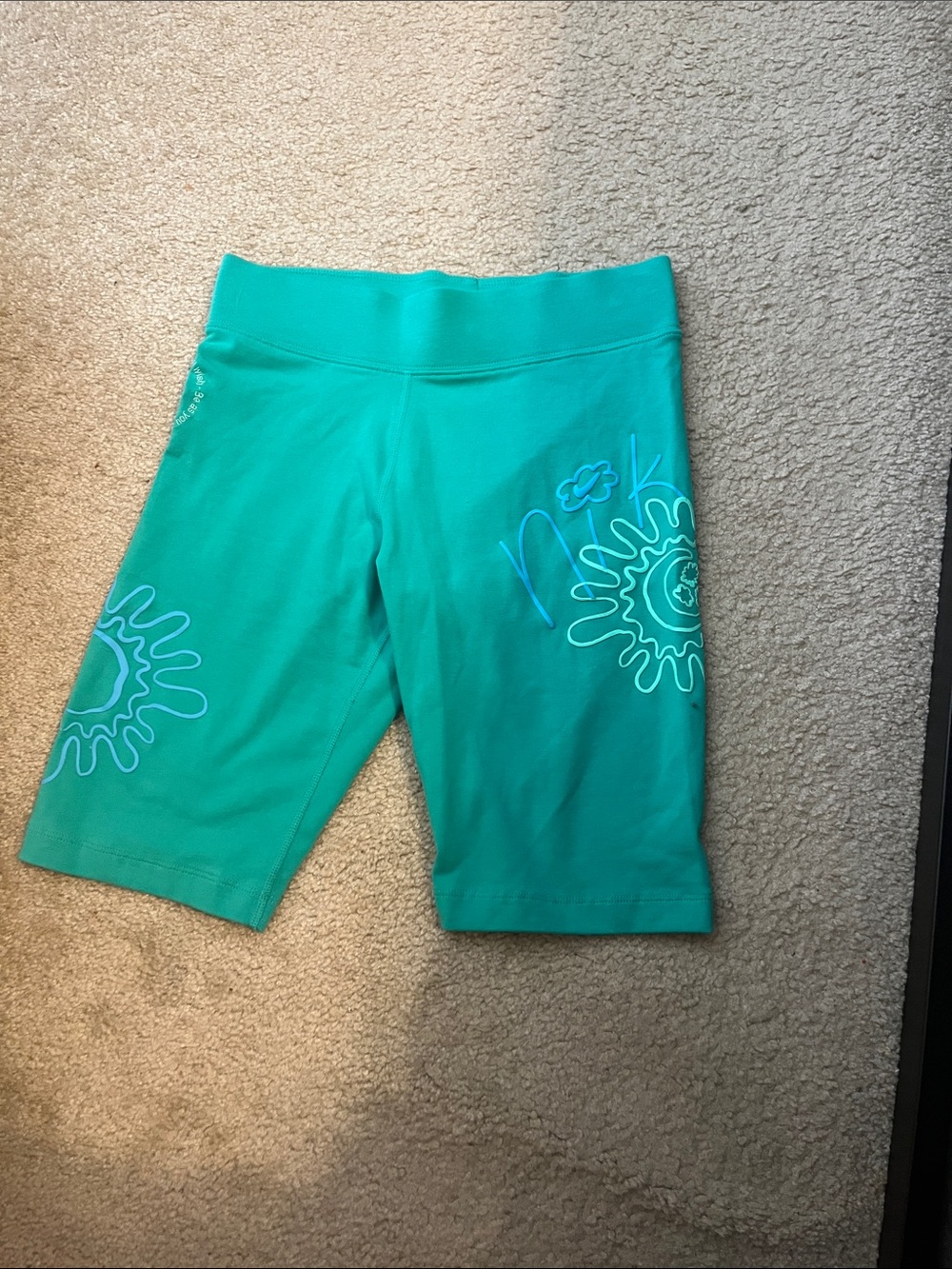 Nike Teal Athletic Bike Shorts with White Floral Graphics